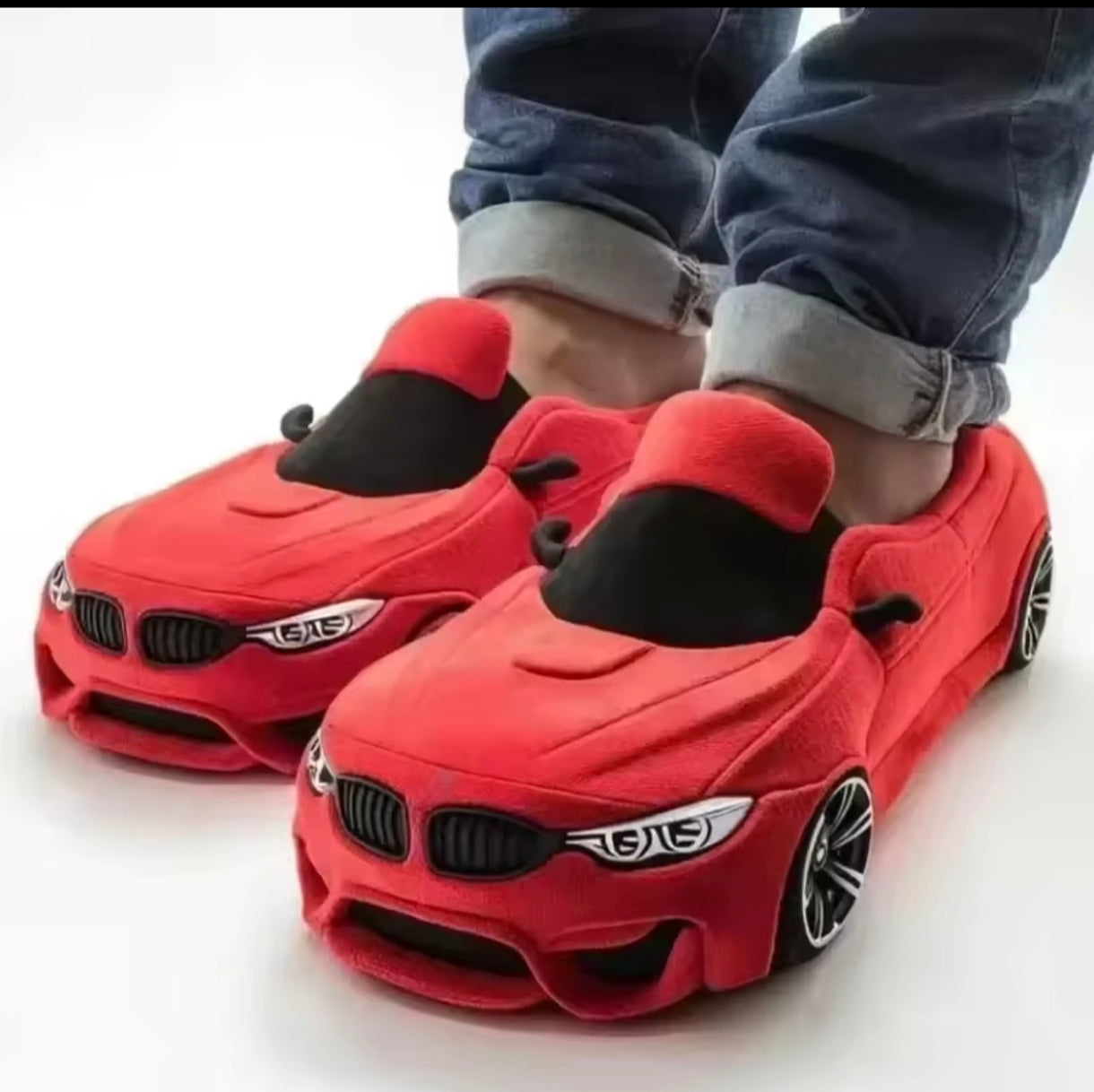 Plush slippers in the shape of a BMW and Porsche.