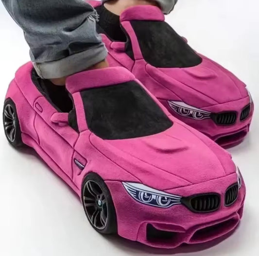 Plush slippers in the shape of a BMW and Porsche.